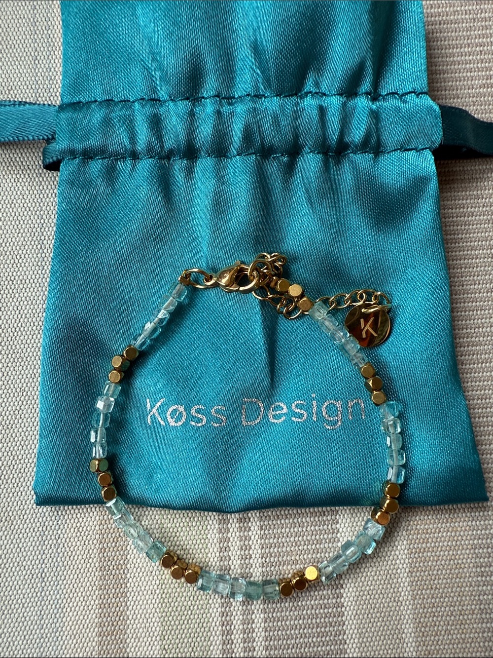 Koss Design Gold & Light Blue Beaded Bracelet